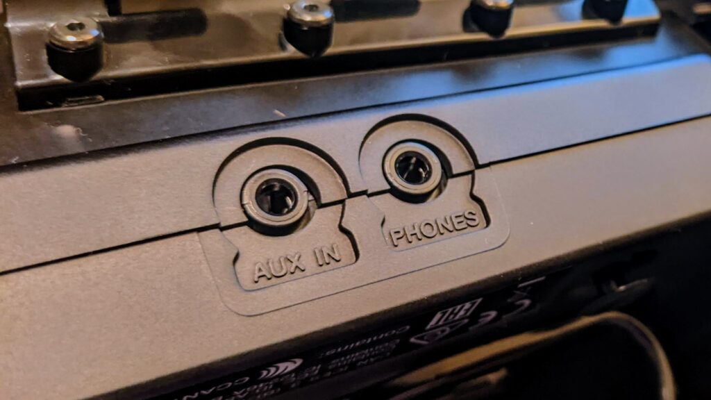 The Aux and Headphone jacks on a YDS-150